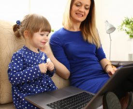 cute-little-girl-couch-with-mom-use-laptop_151013-10006